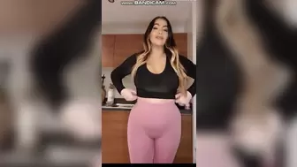 attractive milf shows large behind in leggings