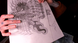 Schoolgirl showing her sketch to adult uncle