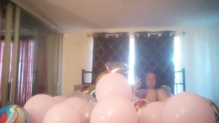 Roommate films me smoking and popping balloons in my bra and panties