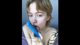 BLONDE IS PLAYING WITH A DILDO