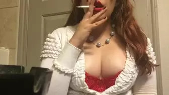 Chubby Smoking Goddess Showing off Giant Perky Breasts Red Bra and Sweater